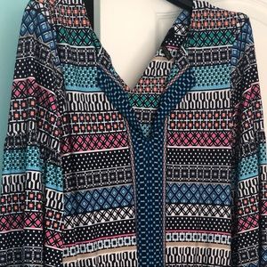 Romper multi color, never worn.